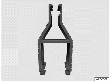 Fig. 2 Pinzas de plástico para extraer o colocar fusibles